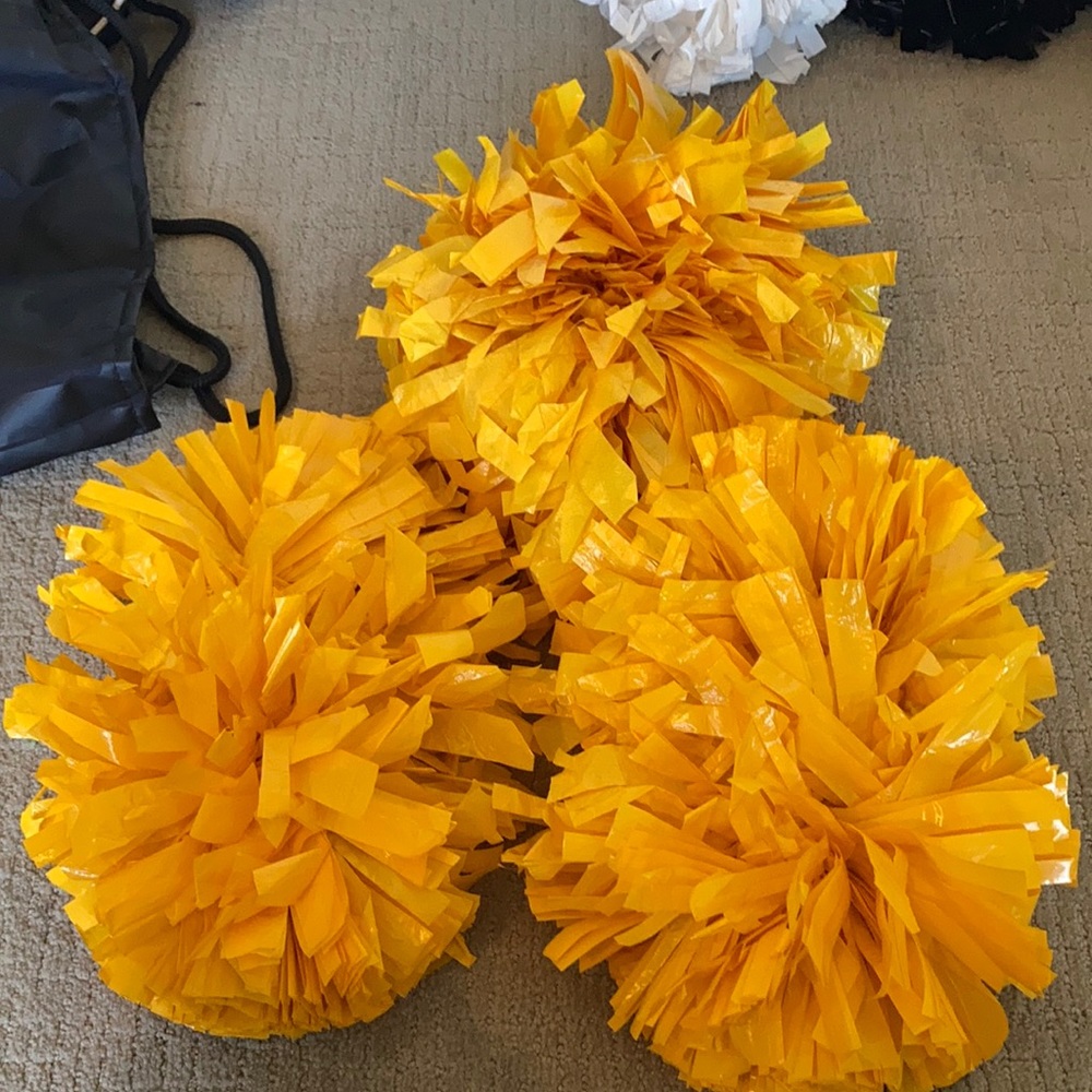 Varsity gold poms